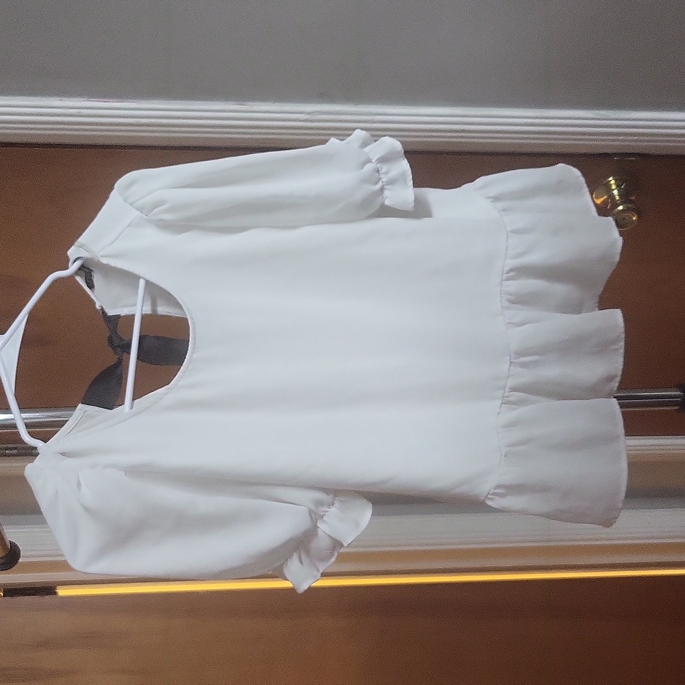 White blouse with open back